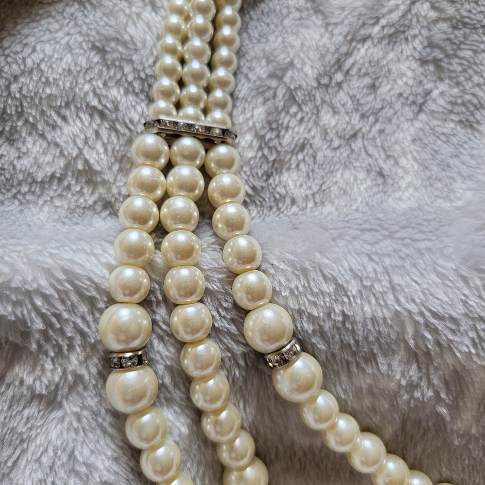 Beautiful earrings and multi strand necklace set